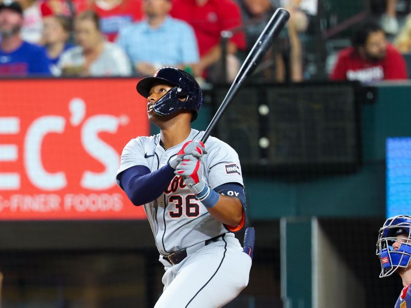 Jun 5, 2024; Arlington, Texas, USA;  Detroit Tigers designated hitter Justyn-Henry Malloy (36) hits a home run during the sixth inning against the Texas Rangers at Globe Life Field. Mandatory Credit: Kevin Jairaj-USA TODAY Sports