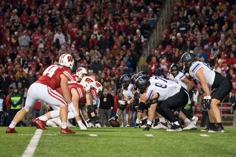 Nov 11, 2023; Madison, Wisconsin, USA;  The Northwestern Wildcats line up for a play during the third quarter against the Wisconsin Badgers at Camp Randall Stadium. Mandatory Credit: Jeff Hanisch-USA TODAY Sports