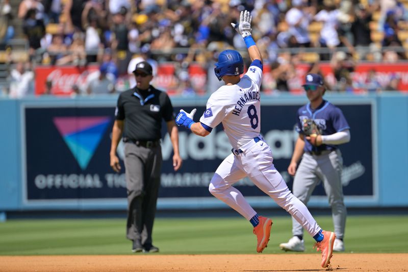 Aug 25, 2024; Los Angeles, California, USA;  Los Angeles Dodgers third baseman Enrique Hernandez (8) rounds the bases after hitting a solo home run in the fifth inning against the Tampa Bay Rays at Dodger Stadium. Mandatory Credit: Jayne Kamin-Oncea-USA TODAY Sports