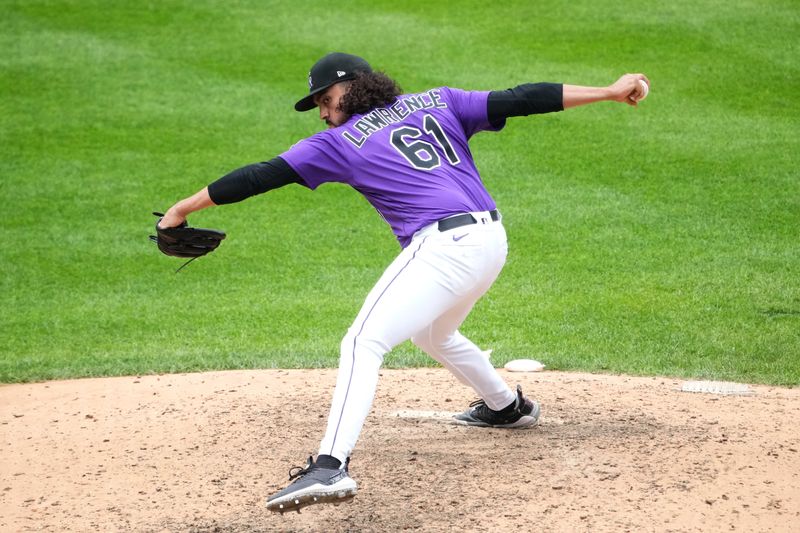 Jul 30, 2023; Denver, Colorado, USA; Colorado Rockies relief pitcher Justin Lawrence (61) pitches in the ninth inning against the Oakland Athletics at Coors Field. Mandatory Credit: Ron Chenoy-USA TODAY Sports