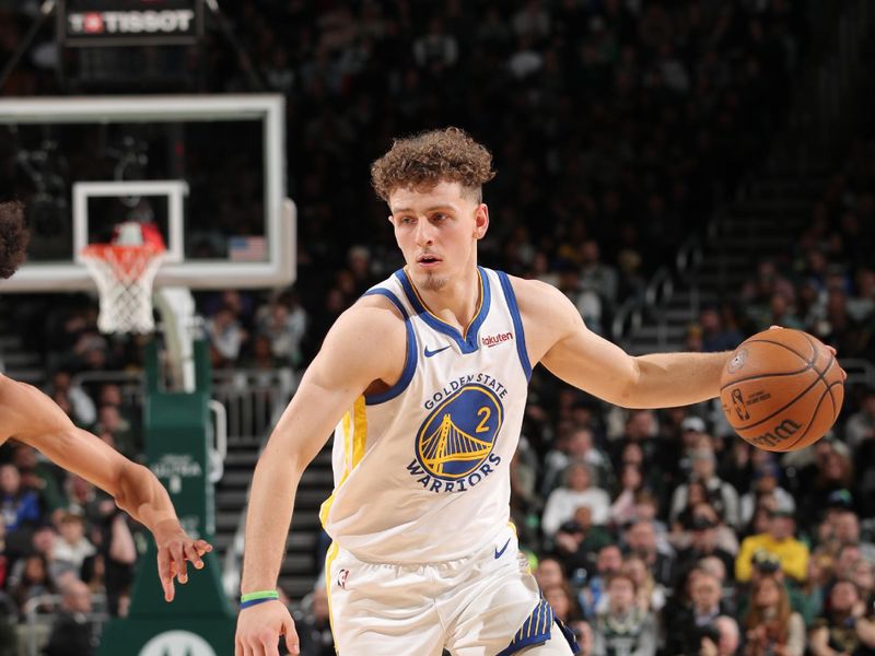 MILWAUKEE, WI - JANUARY 13: Brandin Podziemski #2 of the Golden State Warriors dribbles the ball during the game against the Milwaukee Bucks on January 13, 2024 at the Fiserv Forum Center in Milwaukee, Wisconsin. NOTE TO USER: User expressly acknowledges and agrees that, by downloading and or using this Photograph, user is consenting to the terms and conditions of the Getty Images License Agreement. Mandatory Copyright Notice: Copyright 2024 NBAE (Photo by Gary Dineen/NBAE via Getty Images).