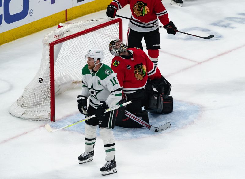 Apr 6, 2024; Chicago, Illinois, USA; Chicago Blackhawks goaltender Petr Mrazek (34) reacts after Dallas Stars center Roope Hintz (24) scored a goal during the second period at United Center. Mandatory Credit: Seeger Gray-USA TODAY Sports