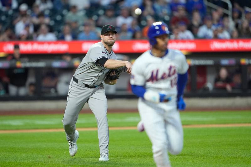 Apr 30, 2025; New York City, New York, USA; Arizona Diamondbacks pitcher Corbin Burnes (39) throws out New York Mets shortstop Francisco Lindor (12) after fielding a ground ball during the second inning at Citi Field. Mandatory Credit: Gregory Fisher-Imagn Images