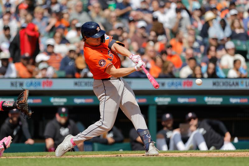 May 12, 2024; Detroit, Michigan, USA;  Houston Astros center fielder Jake Meyers (6) hits an RBI single in the eighth inning against the Detroit Tigers at Comerica Park. Mandatory Credit: Rick Osentoski-USA TODAY Sports