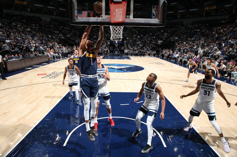 MINNEAPOLIS, MN -  OCTOBER 17: Michael Porter Jr. #1 of the Denver Nuggets drives to the basket during the game against the Minnesota Timberwolves during the 2024 NBA Preseason on October 17, 2024 at Target Center in Minneapolis, Minnesota. NOTE TO USER: User expressly acknowledges and agrees that, by downloading and or using this Photograph, user is consenting to the terms and conditions of the Getty Images License Agreement. Mandatory Copyright Notice: Copyright 2024 NBAE (Photo by David Sherman/NBAE via Getty Images)