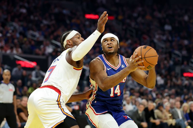 SAN FRANCISCO, CALIFORNIA - JANUARY 02: Ricky Council IV #14 of the Philadelphia 76ers is guarded by Buddy Hield #7 of the Golden State Warriors in the first half at Chase Center on January 02, 2025 in San Francisco, California. NOTE TO USER: User expressly acknowledges and agrees that, by downloading and/or using this photograph, user is consenting to the terms and conditions of the Getty Images License Agreement.   (Photo by Ezra Shaw/Getty Images)