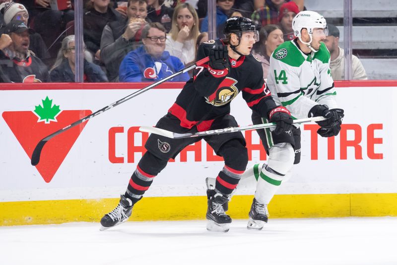 Feb 22, 2024; Ottawa, Ontario, CAN; Ottawa Senators left wing Parker Kelly (27) and Dallas Stars defenseman Joey Hanley (44) chase the puck in the first period at the Canadian Tire Centre. Mandatory Credit: Marc DesRosiers-USA TODAY Sports