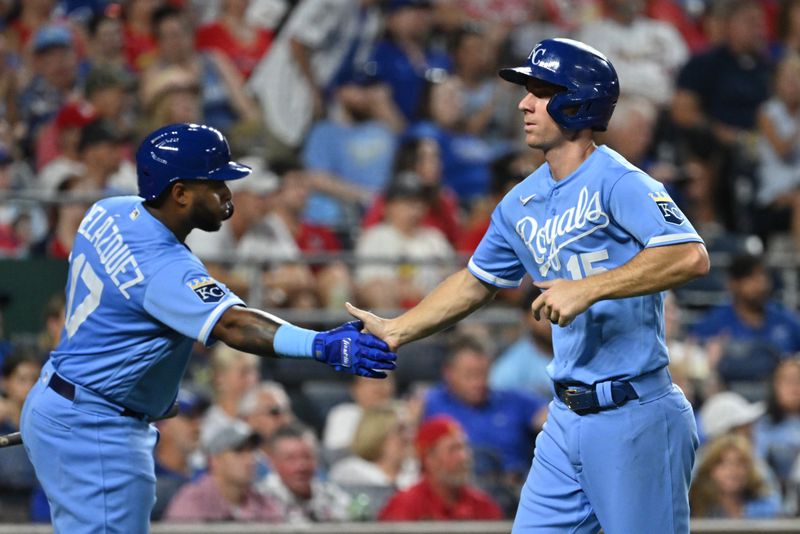 Aug 12, 2023; Kansas City, Missouri, USA;  Kansas City Royals third baseman Matt Duffy (15) celebrates with Nelson Velazquez (17) after scoring a run in the eighth inning against the St. Louis Cardinals at Kauffman Stadium. Mandatory Credit: Peter Aiken-USA TODAY Sports