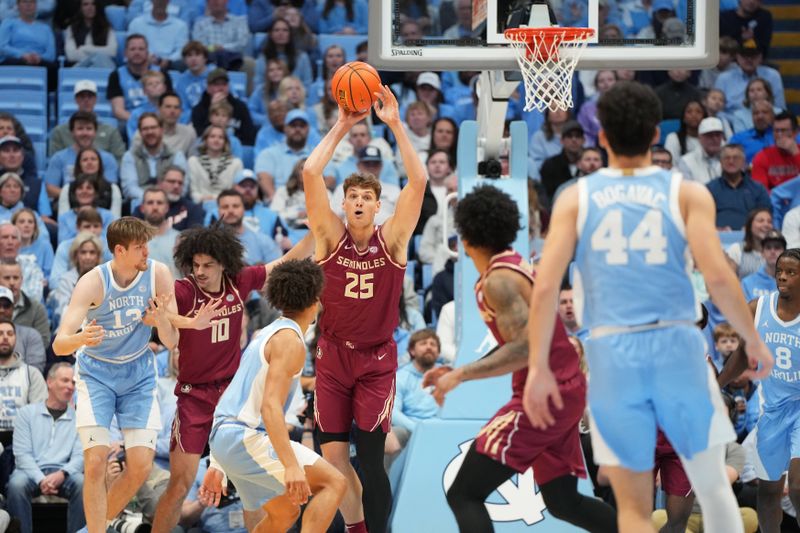 Dec 30, 2025; Chapel Hill, North Carolina, USA; Florida State Seminoles forward Alex Steen (25) looks to pass in the first half at Dean E. Smith Center. Mandatory Credit: Bob Donnan-Imagn Images