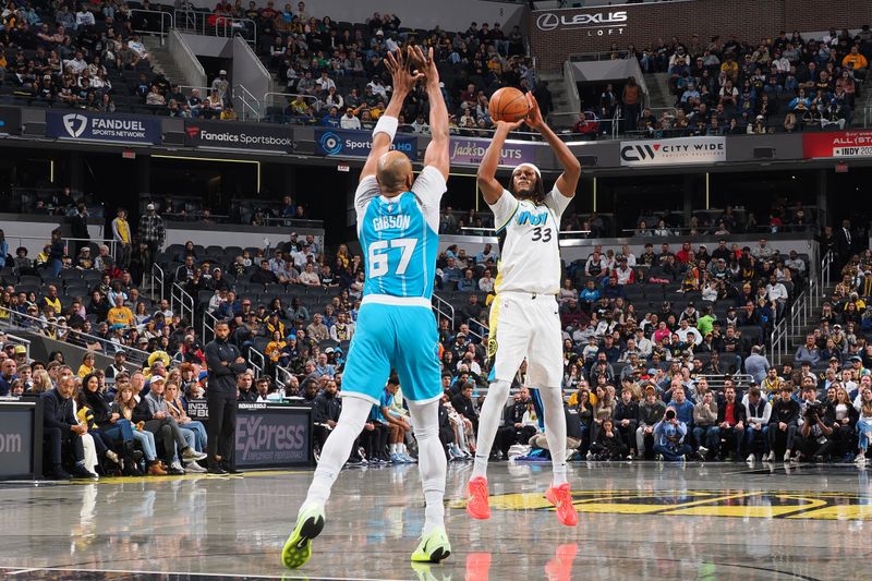 INDIANAPOLIS, IN - DECEMBER 8: Myles Turner #33 of the Indiana Pacers shoots the ball during the game against the Charlotte Hornets on December 8, 2024 at Gainbridge Fieldhouse in Indianapolis, Indiana. NOTE TO USER: User expressly acknowledges and agrees that, by downloading and or using this Photograph, user is consenting to the terms and conditions of the Getty Images License Agreement. Mandatory Copyright Notice: Copyright 2024 NBAE (Photo by Ron Hoskins/NBAE via Getty Images)