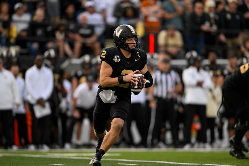 Oct 26, 2024; Nashville, Tennessee, USA; Vanderbilt Commodores quarterback Diego Pavia (2) scrambles against the Texas Longhorns during the first half at FirstBank Stadium. Mandatory Credit: Steve Roberts-Imagn Images
