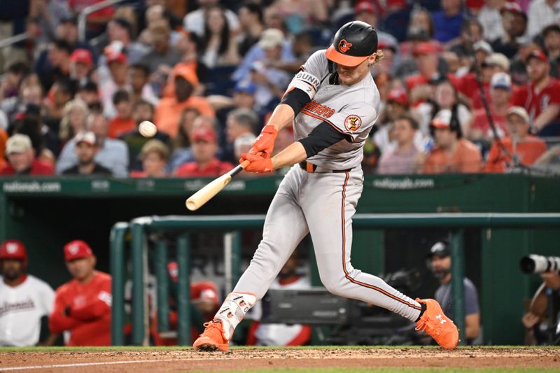 May 8, 2024; Washington, District of Columbia, USA; Baltimore Orioles' Gunnar Henderson (2) hits a home run against the Washington Nationals during the sixth inning at Nationals Park. Mandatory Credit: Rafael Suanes-USA TODAY Sports