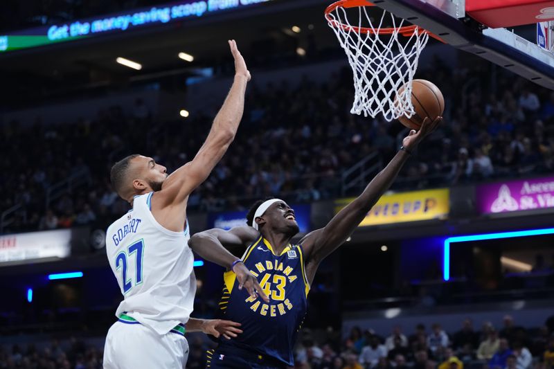 INDIANAPOLIS, INDIANA - MARCH 07: Pascal Siakam #43 of the Indiana Pacers attempts a layup while being guarded by Rudy Gobert #27 of the Minnesota Timberwolves in the first quarter at Gainbridge Fieldhouse on March 07, 2024 in Indianapolis, Indiana. NOTE TO USER: User expressly acknowledges and agrees that, by downloading and or using this photograph, User is consenting to the terms and conditions of the Getty Images License Agreement. (Photo by Dylan Buell/Getty Images)