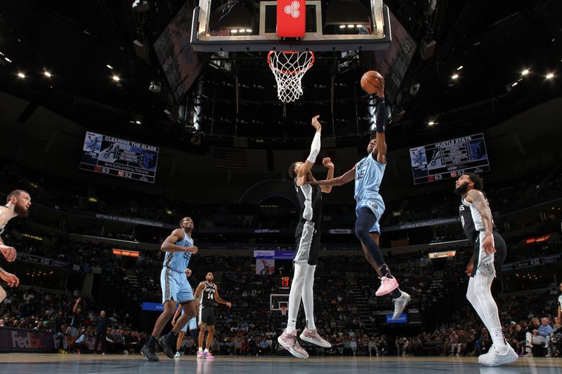 MEMPHIS, TN - APRIL 9: GG Jackson #45 of the Memphis Grizzlies drives to the basket during the game against the San Antonio Spurs on April 9, 2024 at FedExForum in Memphis, Tennessee. NOTE TO USER: User expressly acknowledges and agrees that, by downloading and or using this photograph, User is consenting to the terms and conditions of the Getty Images License Agreement. Mandatory Copyright Notice: Copyright 2024 NBAE (Photo by Joe Murphy/NBAE via Getty Images)