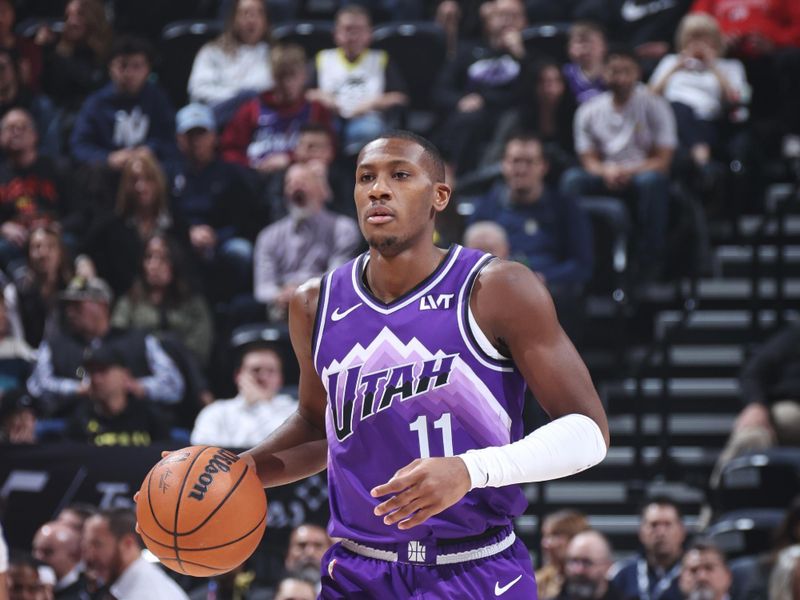 SALT LAKE CITY, UT - FEBRUARY 6: Kris Dunn #11 of the Utah Jazz dribbles the ball during the game against the Oklahoma City Thunder on February 6, 2024 at Delta Center in Salt Lake City, Utah. NOTE TO USER: User expressly acknowledges and agrees that, by downloading and or using this Photograph, User is consenting to the terms and conditions of the Getty Images License Agreement. Mandatory Copyright Notice: Copyright 2024 NBAE (Photo by Melissa Majchrzak/NBAE via Getty Images)