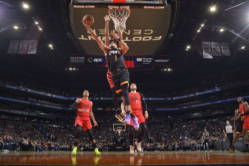 PHOENIX, AZ - NOVEMBER 4: Devin Booker #1 of the Phoenix Suns shoots the ball during the game against the Portland Trail Blazers on November 4, 2022 at Footprint Center in Phoenix, Arizona. NOTE TO USER: User expressly acknowledges and agrees that, by downloading and or using this photograph, user is consenting to the terms and conditions of the Getty Images License Agreement. Mandatory Copyright Notice: Copyright 2022 NBAE (Photo by Barry Gossage/NBAE via Getty Images)