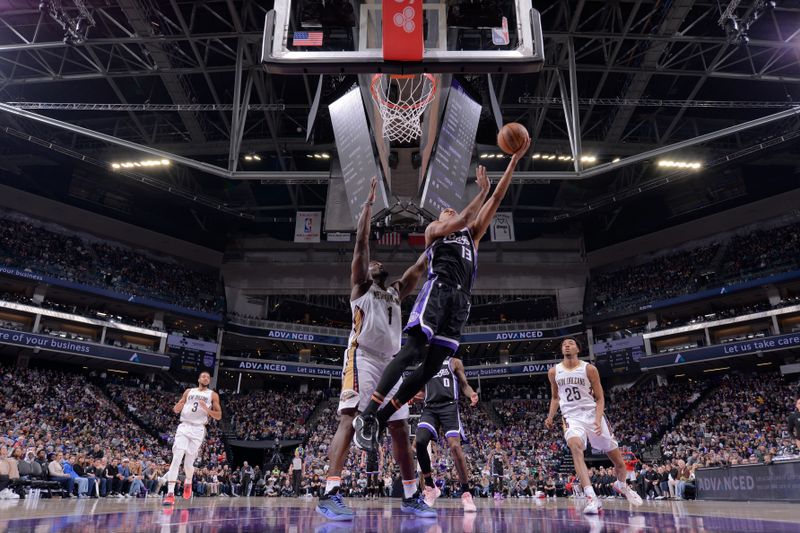 SACRAMENTO, CA - FEBRUARY 8: Keegan Murray #13 of the Sacramento Kings drives to the basket during the game against the New Orleans Pelicans  on February 8, 2025 at Golden 1 Center in Sacramento, California. NOTE TO USER: User expressly acknowledges and agrees that, by downloading and or using this Photograph, user is consenting to the terms and conditions of the Getty Images License Agreement. Mandatory Copyright Notice: Copyright 2025 NBAE (Photo by Rocky Widner/NBAE via Getty Images)