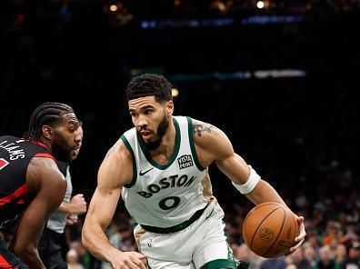 Boston, MA - November 28: Boston Celtics SF Jayson Tatum drives into the paint in the second half. The Celtics beat the Chicago Bulls, 124-97. (Photo by Danielle Parhizkaran/The Boston Globe via Getty Images)