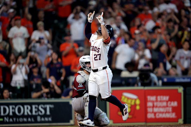 Sep 7, 2024; Houston, Texas, USA; Houston Astros second baseman Jose Altuve (27) crosses home plate after hitting a home run against the Arizona Diamondbacks during the seventh inning at Minute Maid Park. Mandatory Credit: Erik Williams-Imagn Images
