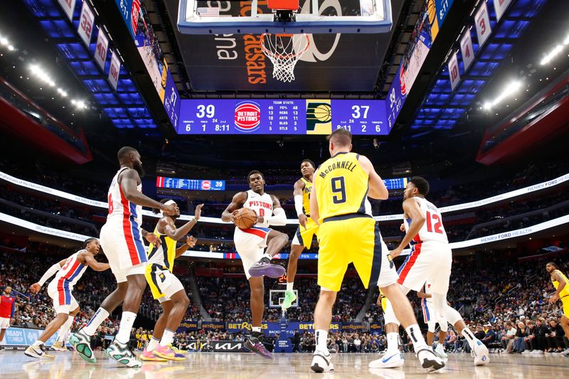 DETROIT, MI - OCTOBER 23: Jalen Duren #0 of the Detroit Pistons grabs the rebound during the game against the Indiana Pacers on October 23, 2024 at Little Caesars Arena in Detroit, Michigan. NOTE TO USER: User expressly acknowledges and agrees that, by downloading and/or using this photograph, User is consenting to the terms and conditions of the Getty Images License Agreement. Mandatory Copyright Notice: Copyright 2024 NBAE (Photo by Brian Sevald/NBAE via Getty Images)