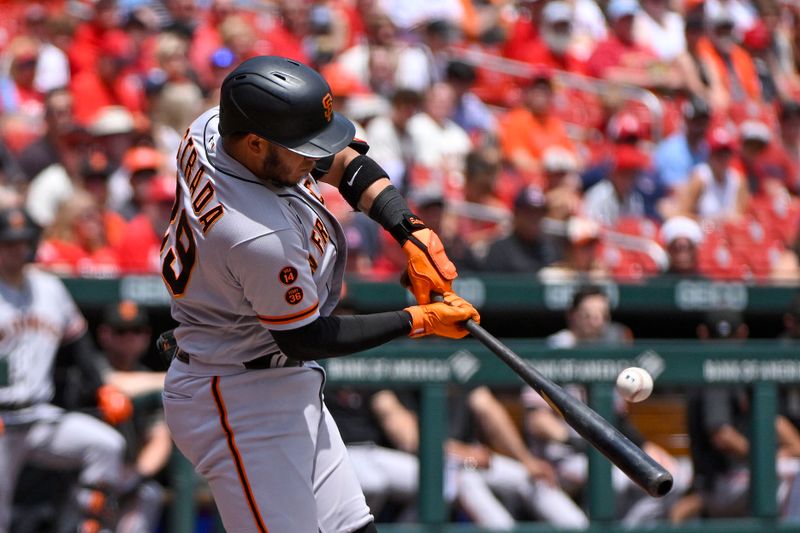 Jun 14, 2023; St. Louis, Missouri, USA;  San Francisco Giants second baseman Thairo Estrada (39) hits a one run single against the St. Louis Cardinals during the first inning at Busch Stadium. Mandatory Credit: Jeff Curry-USA TODAY Sports