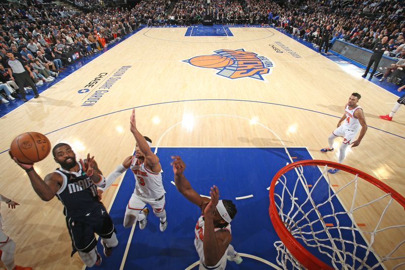 NEW YORK, NY - FEBRUARY 8: Kyrie Irving #11 of the Dallas Mavericks shoots the ball during the game against the New York Knicks on February 8, 2024 at Madison Square Garden in New York City, New York.  NOTE TO USER: User expressly acknowledges and agrees that, by downloading and or using this photograph, User is consenting to the terms and conditions of the Getty Images License Agreement. Mandatory Copyright Notice: Copyright 2024 NBAE  (Photo by Nathaniel S. Butler/NBAE via Getty Images)