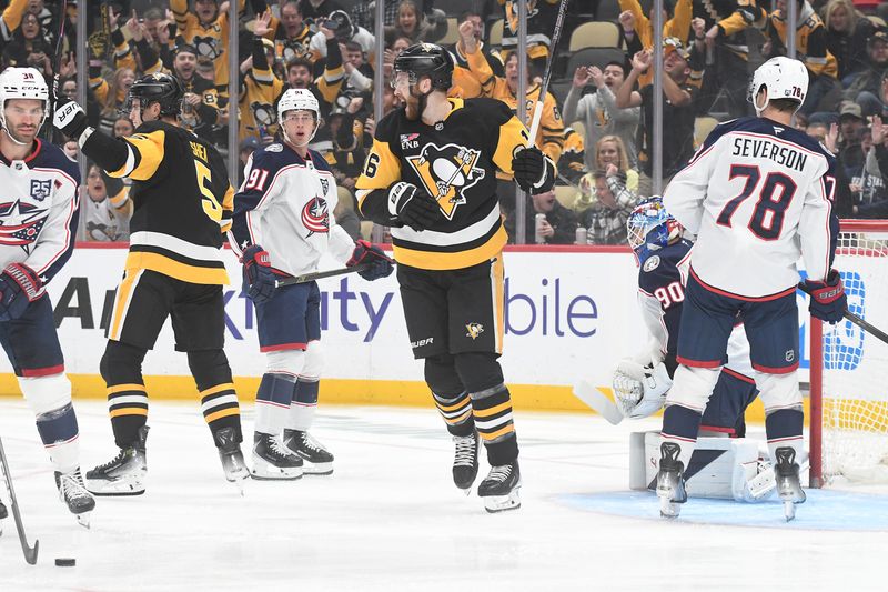 Oct 25, 2025; Pittsburgh, Pennsylvania, USA; Pittsburgh Penguins defenseman Ryan Shea (5) celebrates a goal as right wing Justin Brazeau (16) reacts in front of Columbus Blue Jackets goalie Elvis Merzlikins (90) during first period action at PPG Paints Arena. Mandatory Credit: Philip G. Pavely-Imagn Images