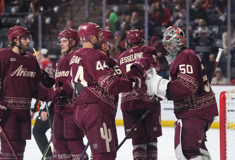 Mar 18, 2023; Tempe, Arizona, USA; Arizona Coyotes goaltender Ivan Prosvetov (50) celebrates with Arizona Coyotes right wing Zack Kassian (44) after defeating the Chicago Blackhawks at Mullett Arena. Mandatory Credit: Joe Camporeale-USA TODAY Sports