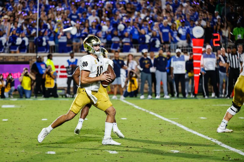 Sep 30, 2023; Durham, North Carolina, USA; Notre Dame Fighting Irish quarterback Sam Hartman (10) prepares to throw the ball during the first half of the game against Duke Blue Devils at Wallace Wade Stadium. Mandatory Credit: Jaylynn Nash-USA TODAY Sports