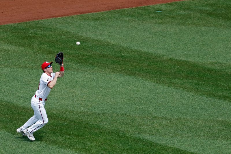 May 22, 2024; Washington, District of Columbia, USA; Washington Nationals outfielder Jacob Young (30) catches a fly ball hit by Minnesota Twins third base Jose Miranda (not pictured) during the seventh inning at Nationals Park. Mandatory Credit: Geoff Burke-USA TODAY Sports