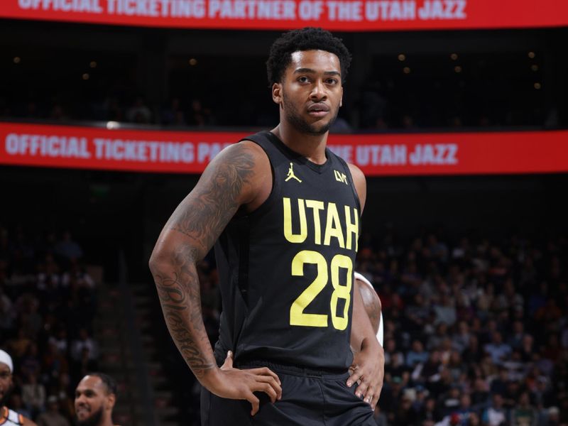 SALT LAKE CITY, UT - NOVEMBER 12: Brice Sensabaugh #28 of the Utah Jazz looks on during the game during the game against the Phoenix Suns during the Emirates NBA Cup game on November 12, 2024 at vivint.SmartHome Arena in Salt Lake City, Utah. NOTE TO USER: User expressly acknowledges and agrees that, by downloading and or using this Photograph, User is consenting to the terms and conditions of the Getty Images License Agreement. Mandatory Copyright Notice: Copyright 2024NBAE (Photo by Melissa Majchrzak/NBAE via Getty Images)
