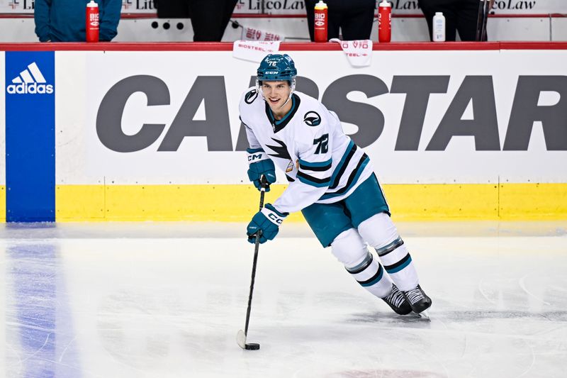 Feb 15, 2024; Calgary, Alberta, CAN; San Jose Sharks left wing William Eklund (72) warms up before a game against the Calgary Flames at Scotiabank Saddledome. Mandatory Credit: Brett Holmes-USA TODAY Sports