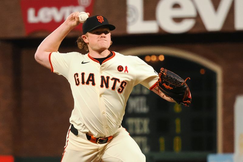 Jul 31, 2024; San Francisco, California, USA; San Francisco Giants starting pitcher Logan Webb (62) pitches  against the Oakland Athletics during the eighth inning at Oracle Park. Mandatory Credit: Kelley L Cox-USA TODAY Sports