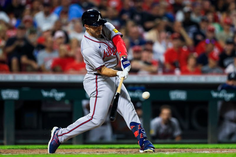 Sep 17, 2024; Cincinnati, Ohio, USA; Atlanta Braves outfielder Ramon Laureano (18) hits a single in the eighth inning against the Cincinnati Reds at Great American Ball Park. Mandatory Credit: Katie Stratman-Imagn Images