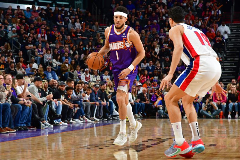 PHOENIX, AZ - FEBRUARY 14: Devin Booker #1 of the Phoenix Suns looks on during the game against the Detroit Pistons on February 14, 2024 at Footprint Center in Phoenix, Arizona. NOTE TO USER: User expressly acknowledges and agrees that, by downloading and or using this photograph, user is consenting to the terms and conditions of the Getty Images License Agreement. Mandatory Copyright Notice: Copyright 2024 NBAE (Photo by Kate Frese/NBAE via Getty Images)