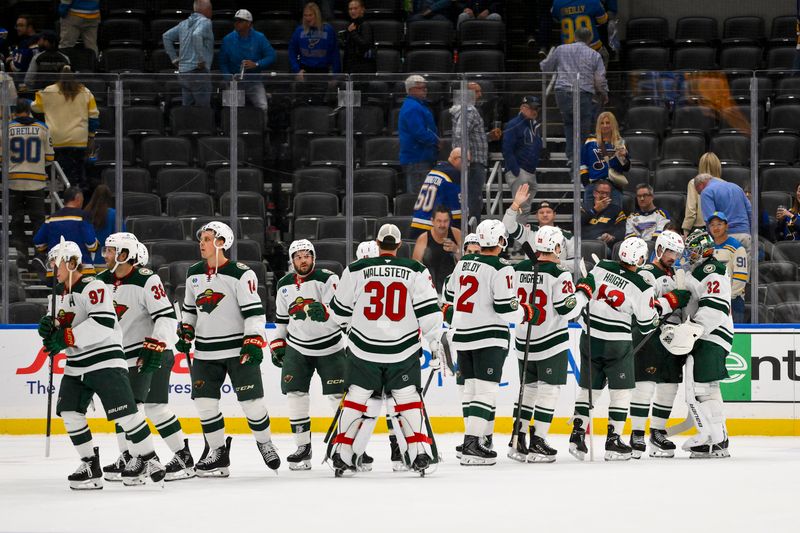 Oct 9, 2025; St. Louis, Missouri, USA; Minnesota Wild celebrate after they defeated the St. Louis Blues at Enterprise Center. Mandatory Credit: Jeff Curry-Imagn Images