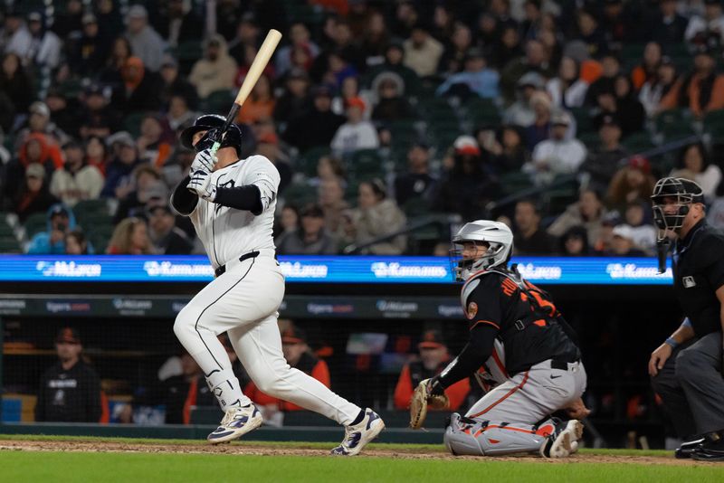 Apr 26, 2025; Detroit, Michigan, USA; Detroit Tigers first base Spencer Torkelson (20) hits a double to left field and drives in two runs in the seventh inning during game two of a double header against the Baltimore Orioles at Comerica Park. Mandatory Credit: David Reginek-Imagn Images