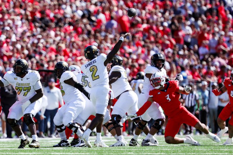 Oct 19, 2024; Tucson, Arizona, USA; Colorado Buffaloes quarterback Shedeur Sanders (2) throws the ball against the Arizona Wildcats during the first quarter at Arizona Stadium. Mandatory Credit: Aryanna Frank-Imagn Images