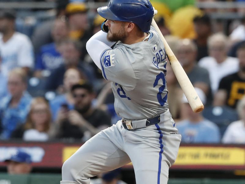 Sep 13, 2024; Pittsburgh, Pennsylvania, USA;  Kansas City Royals center fielder Kyle Isbel (28) hits an RBI double against the Pittsburgh Pirates during the second inning at PNC Park. Mandatory Credit: Charles LeClaire-Imagn Images