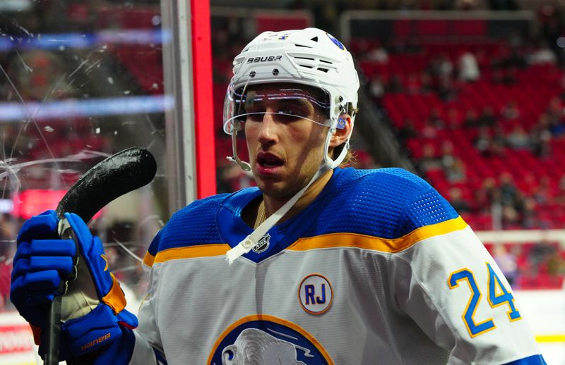 Dec 2, 2023; Raleigh, North Carolina, USA; Buffalo Sabres center Dylan Cozens (24) comes off the ice after the warmups before the game against the Carolina Hurricanes at PNC Arena. Mandatory Credit: James Guillory-USA TODAY Sports