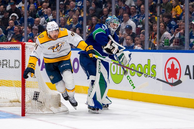 Apr 30, 2024; Vancouver, British Columbia, CAN; Nashville Predators forward Kiefer Sherwood (44) bumps into Vancouver Canucks goalie Arturs Silvos (31) during the second period in game five of the first round of the 2024 Stanley Cup Playoffs at Rogers Arena. Mandatory Credit: Bob Frid-USA TODAY Sports