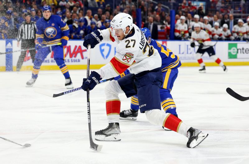 Feb 15, 2024; Buffalo, New York, USA;  Florida Panthers center Eetu Luostarinen (27) takes a shot on goal during the first period against the Buffalo Sabres at KeyBank Center. Mandatory Credit: Timothy T. Ludwig-USA TODAY Sports