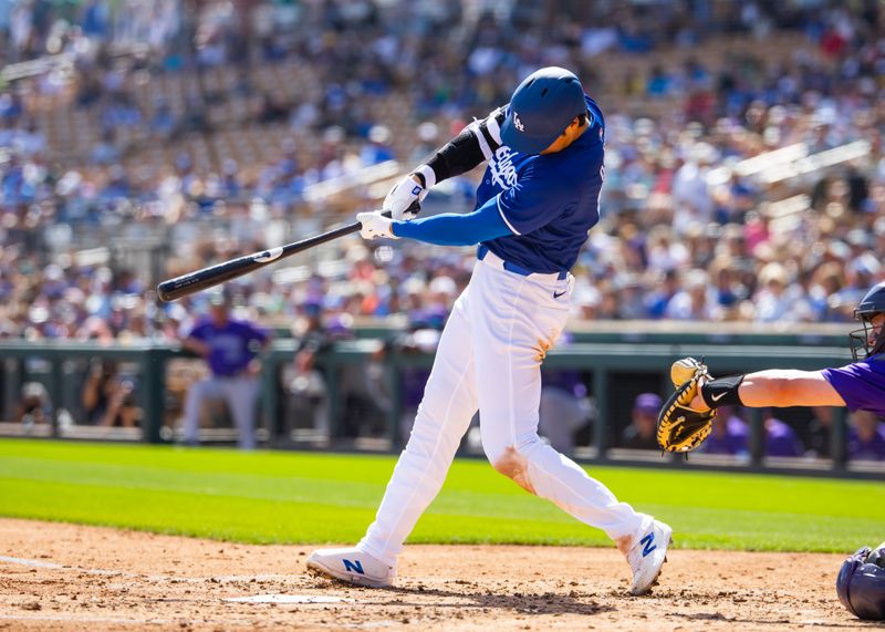 Mar 3, 2024; Phoenix, Arizona, USA; Los Angeles Dodgers designated hitter Shohei Ohtani against the Colorado Rockies during a spring training game at Camelback Ranch-Glendale. Mandatory Credit: Mark J. Rebilas-USA TODAY Sports