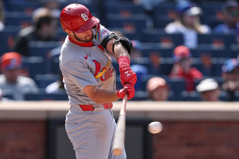 Apr 20, 2025; New York City, New York, USA; St. Louis Cardinals second baseman Thomas Saggese (25) hits a two run double during the seventh inning against the New York Mets at Citi Field. Mandatory Credit: Vincent Carchietta-Imagn Images
