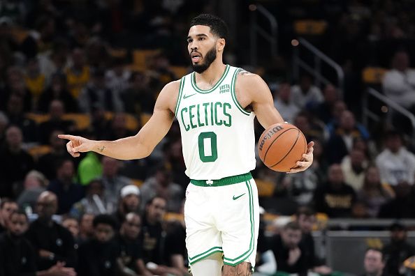 INDIANAPOLIS, INDIANA - DECEMBER 04: Jayson Tatum #0 of the Boston Celtics dribbles the ball in the first quarter against the Indiana Pacers during the NBA In-Season Tournament at Gainbridge Fieldhouse on December 04, 2023 in Indianapolis, Indiana. NOTE TO USER: User expressly acknowledges and agrees that, by downloading and or using this photograph, User is consenting to the terms and conditions of the Getty Images License Agreement. (Photo by Dylan Buell/Getty Images)