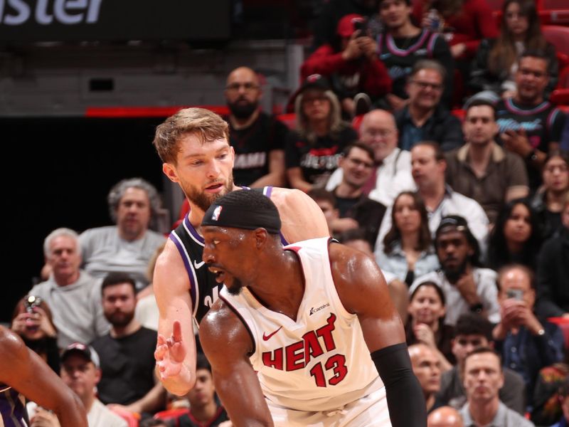 MIAMI, FL - JANUARY 31: Bam Adebayo #13 of the Miami Heat handles the ball during the game against the Sacramento Kings on January 31, 2024 at Kaseya Center in Miami, Florida. NOTE TO USER: User expressly acknowledges and agrees that, by downloading and or using this Photograph, user is consenting to the terms and conditions of the Getty Images License Agreement. Mandatory Copyright Notice: Copyright 2024 NBAE (Photo by Issac Baldizon/NBAE via Getty Images)