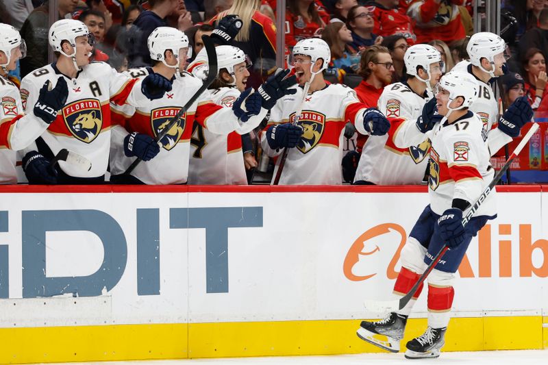 Nov 8, 2023; Washington, District of Columbia, USA; Florida Panthers center Evan Rodrigues (17) celebrates with teammates after scoring a goal against the Washington Capitals in the third period at Capital One Arena. Mandatory Credit: Geoff Burke-USA TODAY Sports