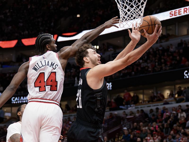 CHICAGO, ILLINOIS - JANUARY 10:  Alperen Sengun #28 of the Houston Rockets controls the ball against the Chicago Bulls on January 10, 2024 at United Center in Chicago, Illinois.  NOTE TO USER: User expressly acknowledges and agrees that, by downloading and or using this photograph, User is consenting to the terms and conditions of the Getty Images License Agreement.  (Photo by Jamie Sabau/Getty Images)