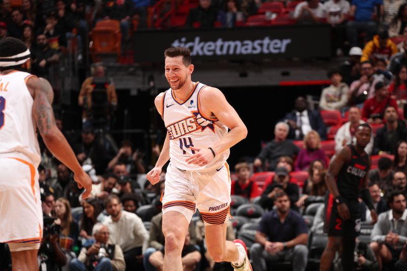 MIAMI, FL - JANUARY 29: Drew Eubanks #14 of the Phoenix Suns smiles during the game against the Miami Heat on January 29, 2024 at Kaseya Center in Miami, Florida. NOTE TO USER: User expressly acknowledges and agrees that, by downloading and or using this Photograph, user is consenting to the terms and conditions of the Getty Images License Agreement. Mandatory Copyright Notice: Copyright 2024 NBAE (Photo by Issac Baldizon/NBAE via Getty Images)