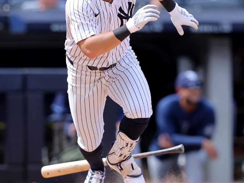 Jul 20, 2024; Bronx, New York, USA; New York Yankees shortstop Anthony Volpe (11) runs out a double during the eighth inning against the Tampa Bay Rays at Yankee Stadium. Mandatory Credit: Brad Penner-USA TODAY Sports